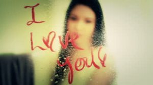 stock-footage-pretty-girl-erases-lipstick-on-mirror-i-love-you-a-beautiful-woman-wipes-off-the-words-i-love-you