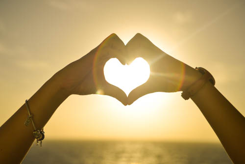 Love-Heart-Made-With-Hands-At-Sunset_1